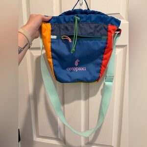 Cotopaxi crossbody cinch tote